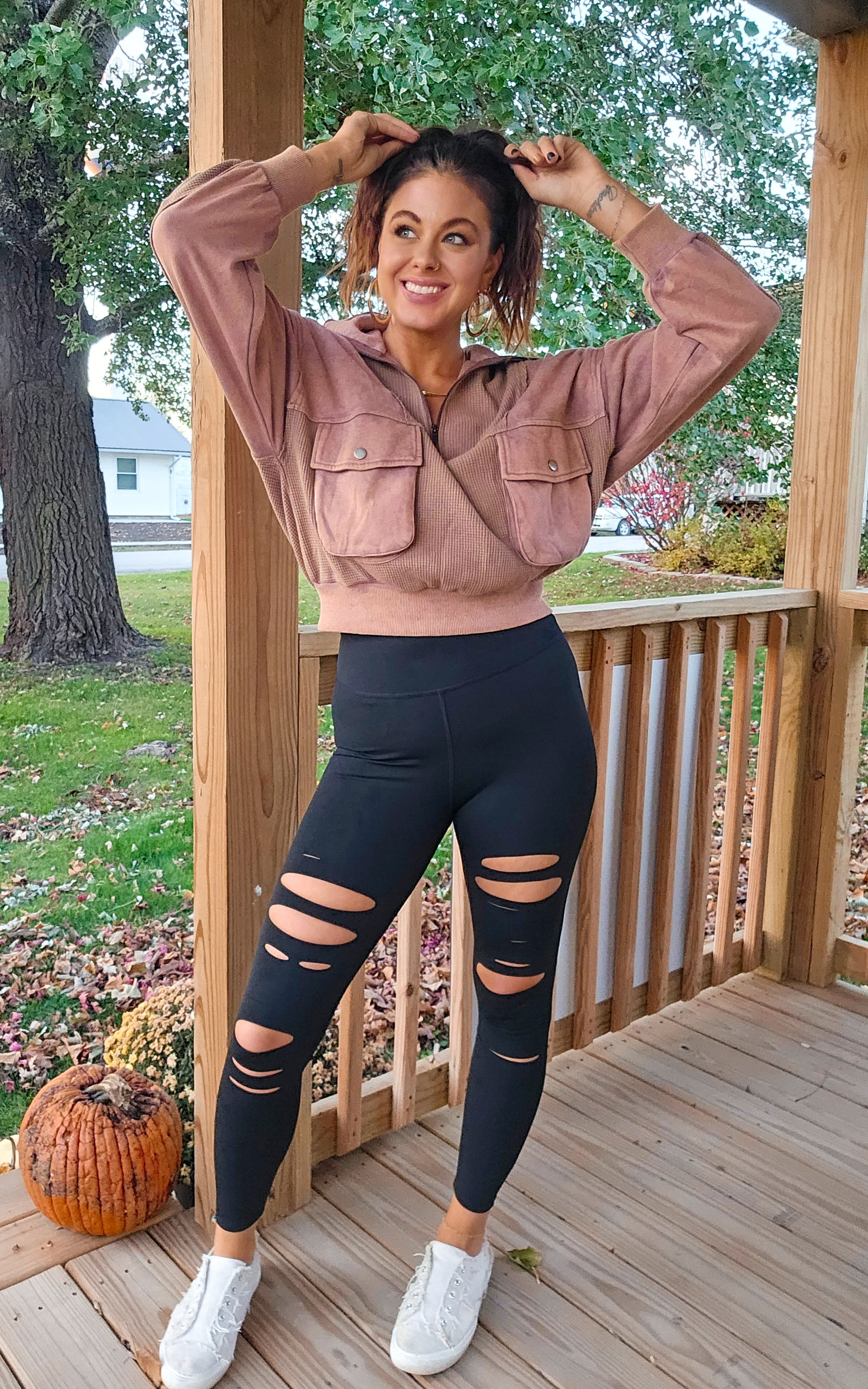 Edgy ripped laser cut leggings paired with the Smooth Rider pullover