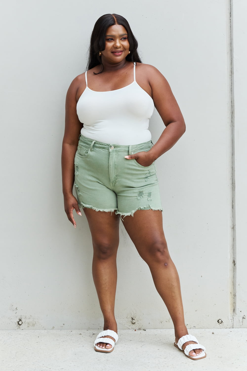 RISEN Katie High Waisted Distressed Shorts in Gum Leaf